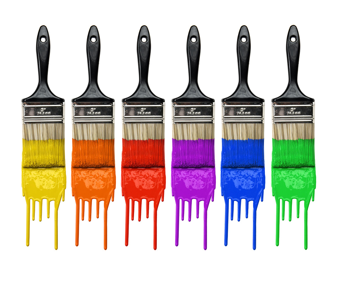 Paintbrushes with dripping paint of different colors isolated over white background